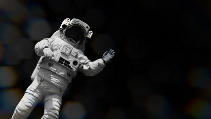 astronaut waving during space walk