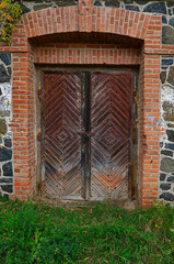 Wooden door to an abandoned old building