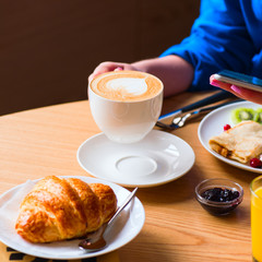  Coffee crepes and criossnat. Breakfast concept.