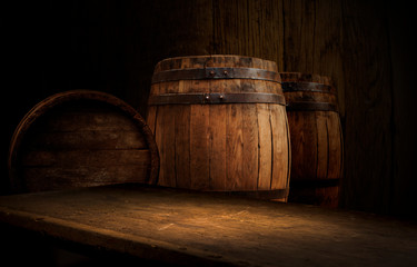 Old wooden barrel on a brown background