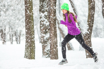 Winter running, exercise woman. Healthy lifestyle