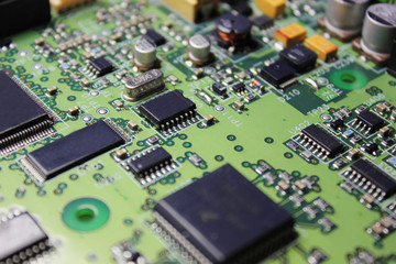 Closeup of electronic circuit board or PCB printed circuit board