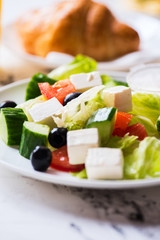 Fresh cucumber olives and feta cheese salad.