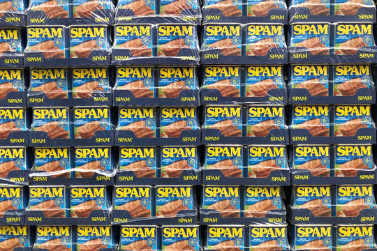 TINS OF SPAM PORK LUNCHEON MEAT, LONDON – JULY 06 2019, Tins or cans of Spam pork luncheon meat, concept photo for unwanted spam email, London, England, Europe