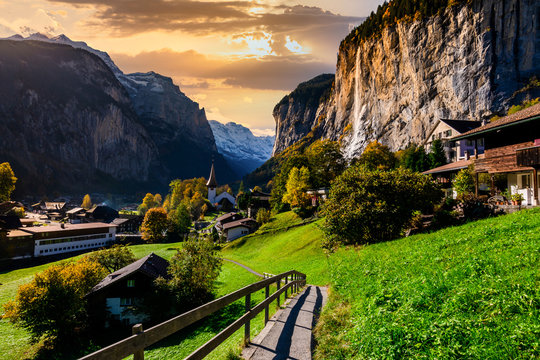 Famous Lauterbrunnen valley with gorgeous waterfall and Swiss Alps, Switzerland.