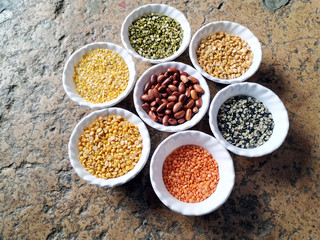Prepared Pulses for cooking on the white bowl isolated on stone background