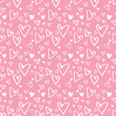 Lovely hand drawn heart shape pattern on light pink background