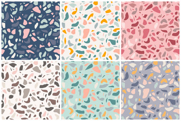 set of six seamless patterns with terrazzo ornament in different colors