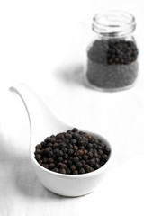 Fresh black cambodian pepper corn in bowl, cooking preparation