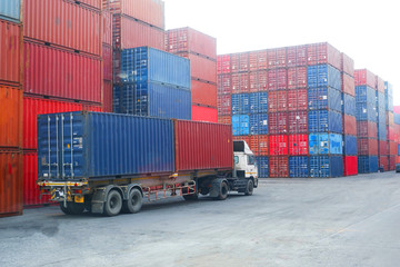 Container trucks in the import and export area at the port