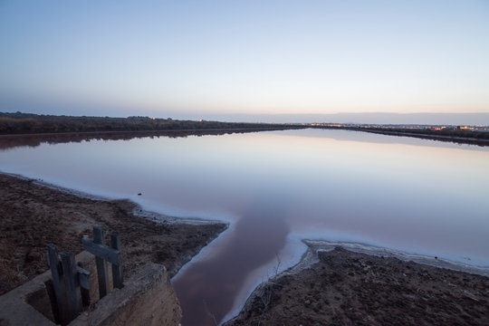 Sunset in Tavira salt ponds Algarve Portugal