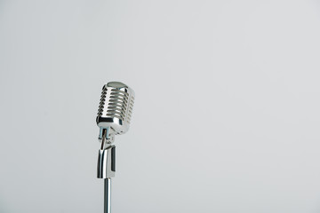 Fototapeta premium retro microphone isolated on grey with copy space