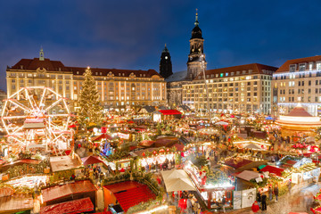 Christmas Market in Dresden, famous traditional European Winter holidays festive activity. Germany, Europe. Christmas vacations background, natural processing photo. - obrazy, fototapety, plakaty