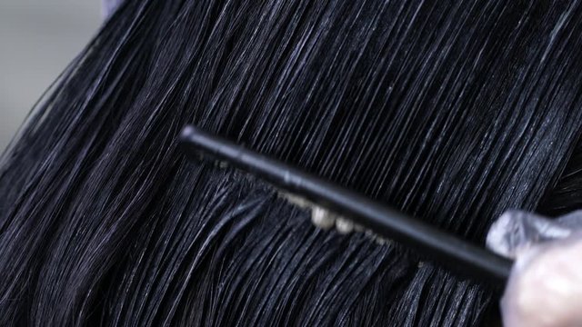 hair coloring, applying hair dye close-up