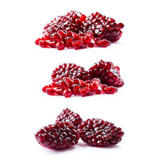 Pomegranate isolated on white background. Sweet and juicy garnet with copy space for text. Garnets isolated on white. Set of pomegranate seed from different angles on white.