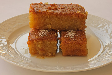 Shambali dessert made with semolina in a white plate.