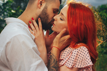 happy, couple in love cuddling, ginger girl. minute to kiss. date