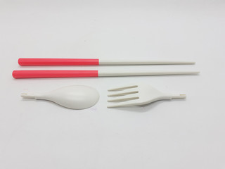 Beautiful Cute Luxury Modern Plastic Ceramics Folded Compact Detachable Eating Cutlery Spoon Fork Packaging for Dining Kitchen Appliances in White isolated Background