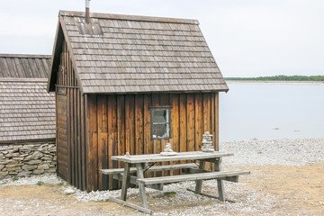 historic wooden hut on the beach in the Gotland