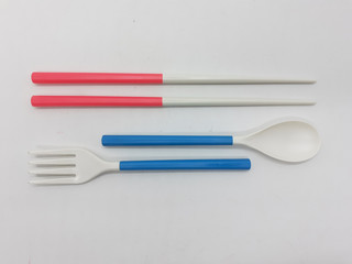 Beautiful Cute Luxury Modern Plastic Ceramics Folded Compact Detachable Eating Cutlery Spoon Fork Packaging for Dining Kitchen Appliances in White isolated Background