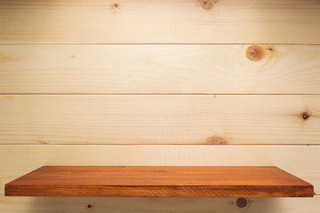 wooden shelf at wall