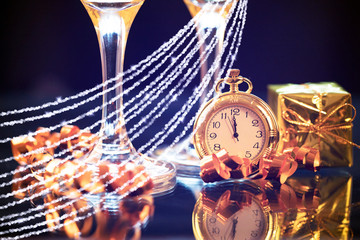 New Year's at midnight - Old clock with holiday lights