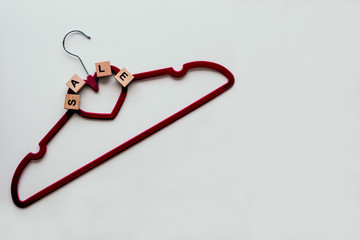 Pink clothing hangers isolated on the white background. Shopping concept. Black Friday Concept.