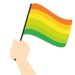 Hand holding and raising Hermaphrodite pride flag isolated on white background