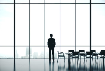 Fototapeta na wymiar Businessman standing in office