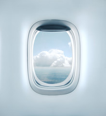 Aairplane window with clouds view - 306890019