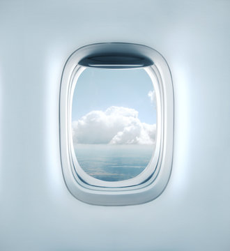 Fototapeta Aairplane window with clouds view