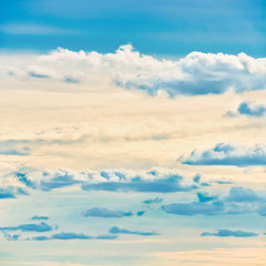 Blue sunset sky background with white clouds