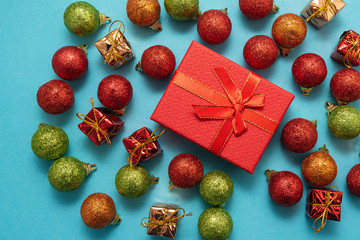 Christmas toys on blue background top view