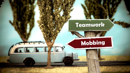 Street Sign to Teamwork versus Mobbing
