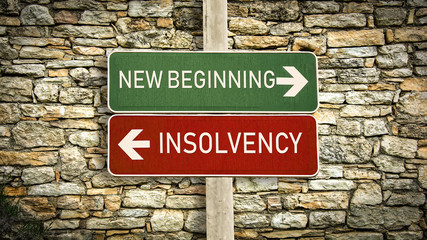 Street Sign to NEW BEGINNING versus INSOLVENCY