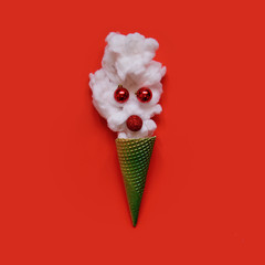 Creative minimal christmas art.Symbol Christmas in ice cram cone.