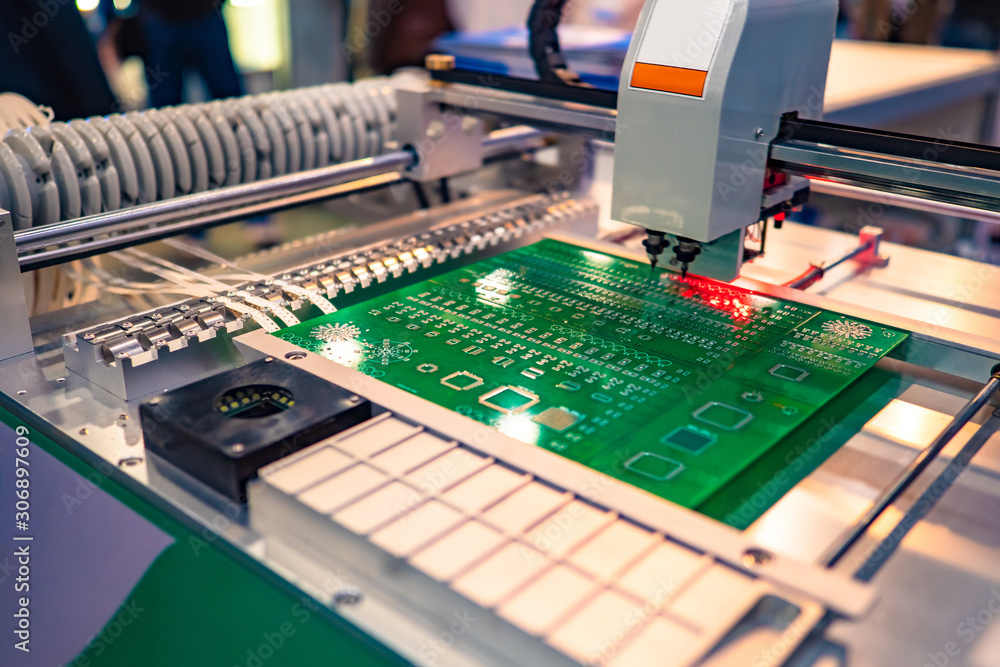 Poster pcb. machine for the production of computer boards. electronic chips. machine creates a chip. proces