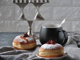 Hannukah celebration concept. Tasty donuts