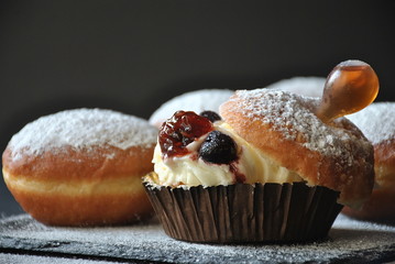 Hannukah celebration concept. Tasty donuts