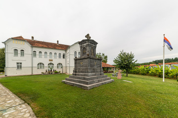Cokesina, Serbia - July 12, 2019: The Cokesina Monastery belongs to the Serbian Orthodox Church. A monument with a tomb was erected in the monastery port in memory of the Serbian uprisings.