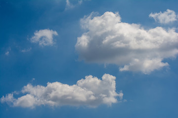 Clear blue sky and white clouds summer background