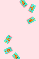 Mint gift box on a pink background.