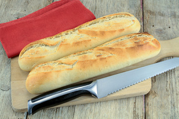 french baguette on a wooden table