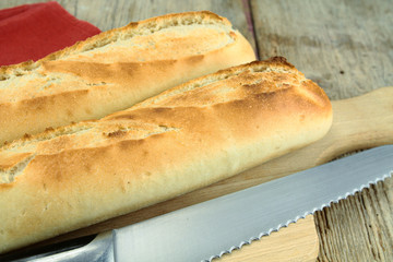 french baguette on a wooden table