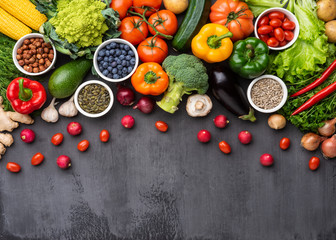 Healthy eating ingredients: fresh vegetables, fruits and superfood. Nutrition, diet, vegan food concept © Acronym