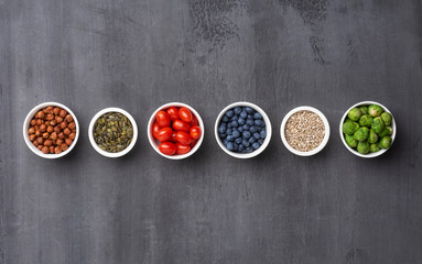 Healthy eating ingredients: fresh vegetables, fruits and superfood. Nutrition, diet, vegan food concept