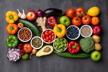 Healthy eating ingredients: fresh vegetables, fruits and superfood. Nutrition, diet, vegan food concept