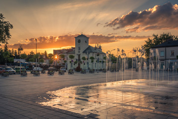 Sunset over the main square in Piaseczno city, Poland