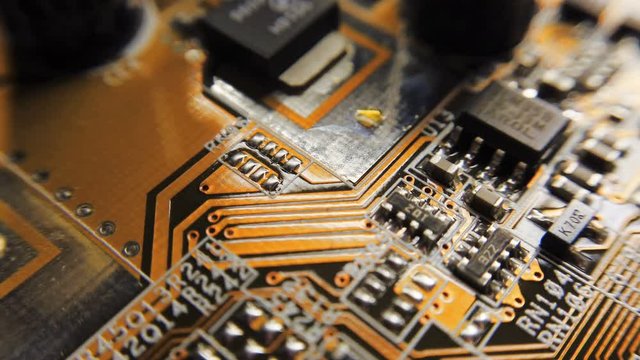 Orange, green technology background circuit board