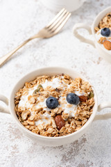 Granola, oatmeal with almond and berry food background